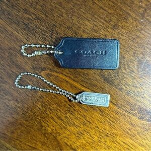 Leather and metal coach bag tag